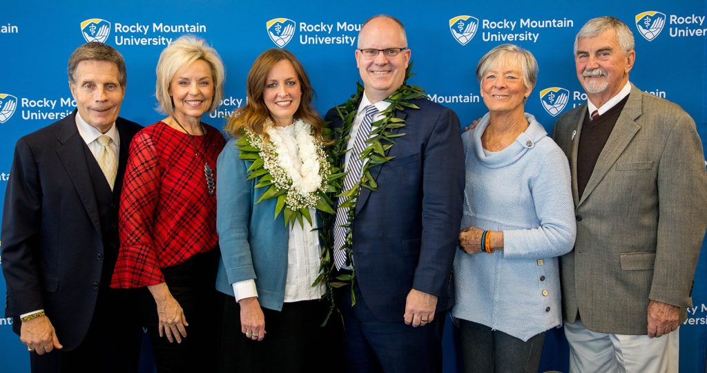 inline_573_https://rm.edu/wp-content/uploads/2022/12/Dr.-Cameron-K.-Martin-Announcement-as-RMU-President-Dec-12-2022-RMU-President-Nielsen-BoT-Chair-Skurja-Dr-Martin-with-spouses-1024x540.jpg