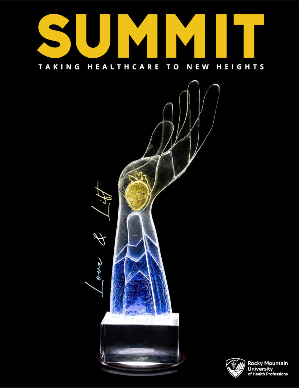 The cover of the Fall 2024 Summit Magazine showing a sculpture of a hand with the words, "love and life."
