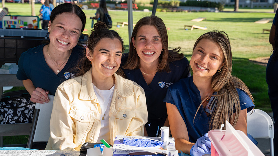 Healthcare professionals at outdoor event