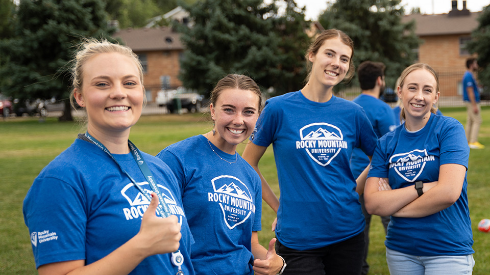 Group of people in blue RMU shirts