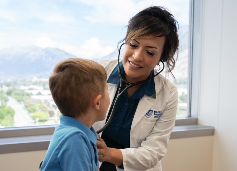 nurses in clinic with child